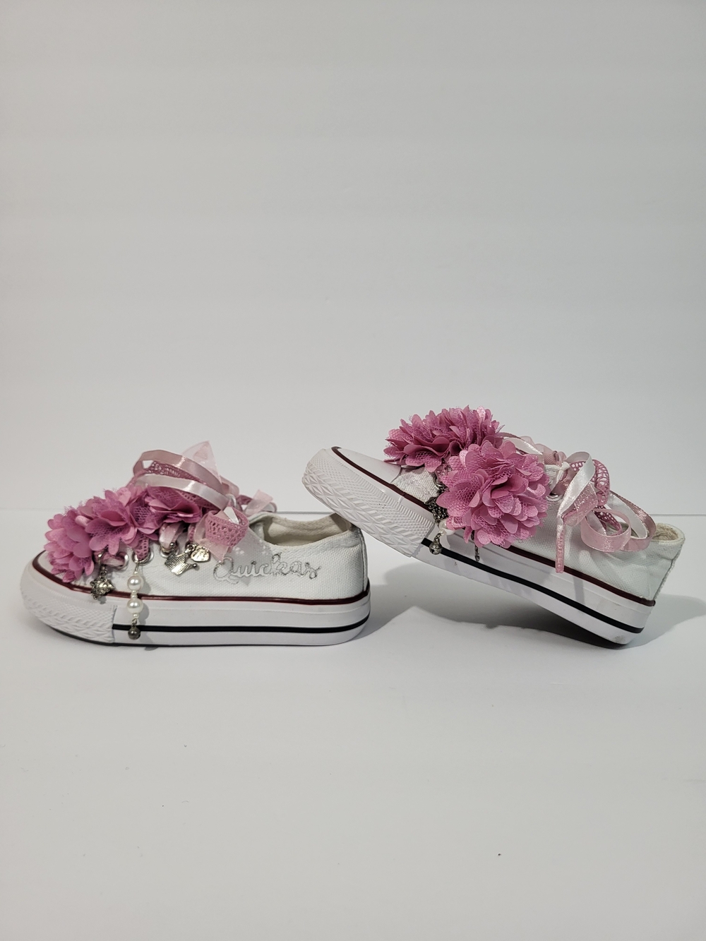 White Kids' Sneakers with Pink Floral Accents and Ribbon Laces